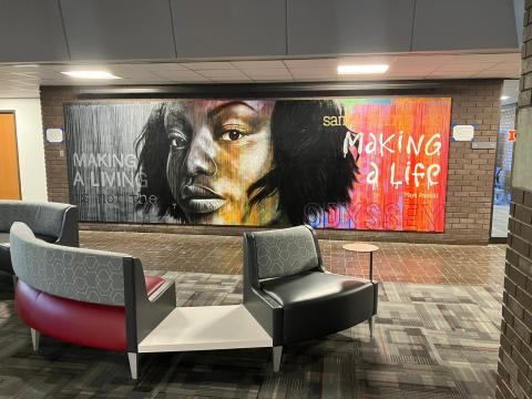 Completed Odyssey Project mural in the Levis Center lobby